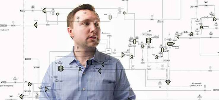 NREL Process Research Engineer, Ryan Davis, works on a target model for commercial scale cellulosic biofuel production.